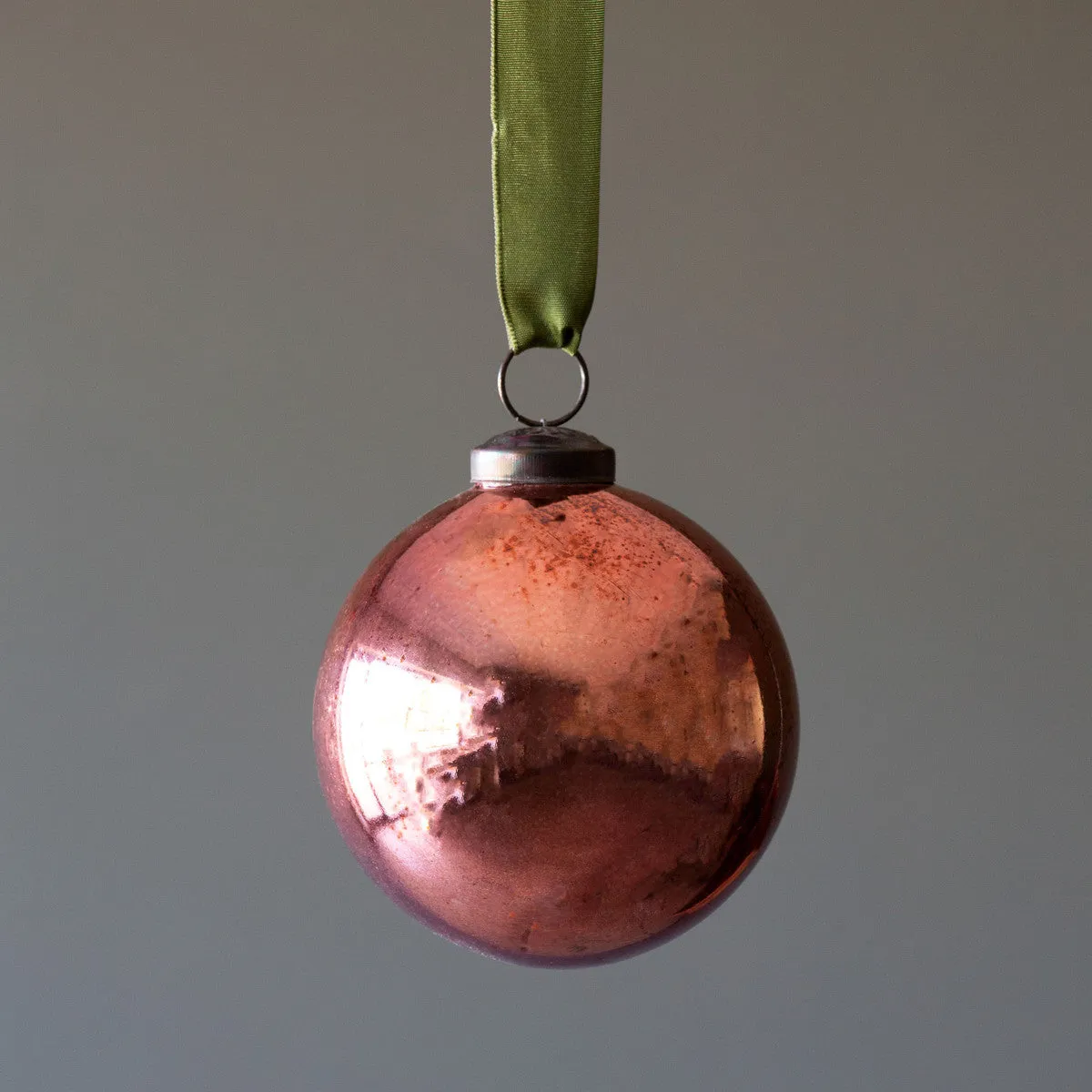 Antique shiny rose glass ball