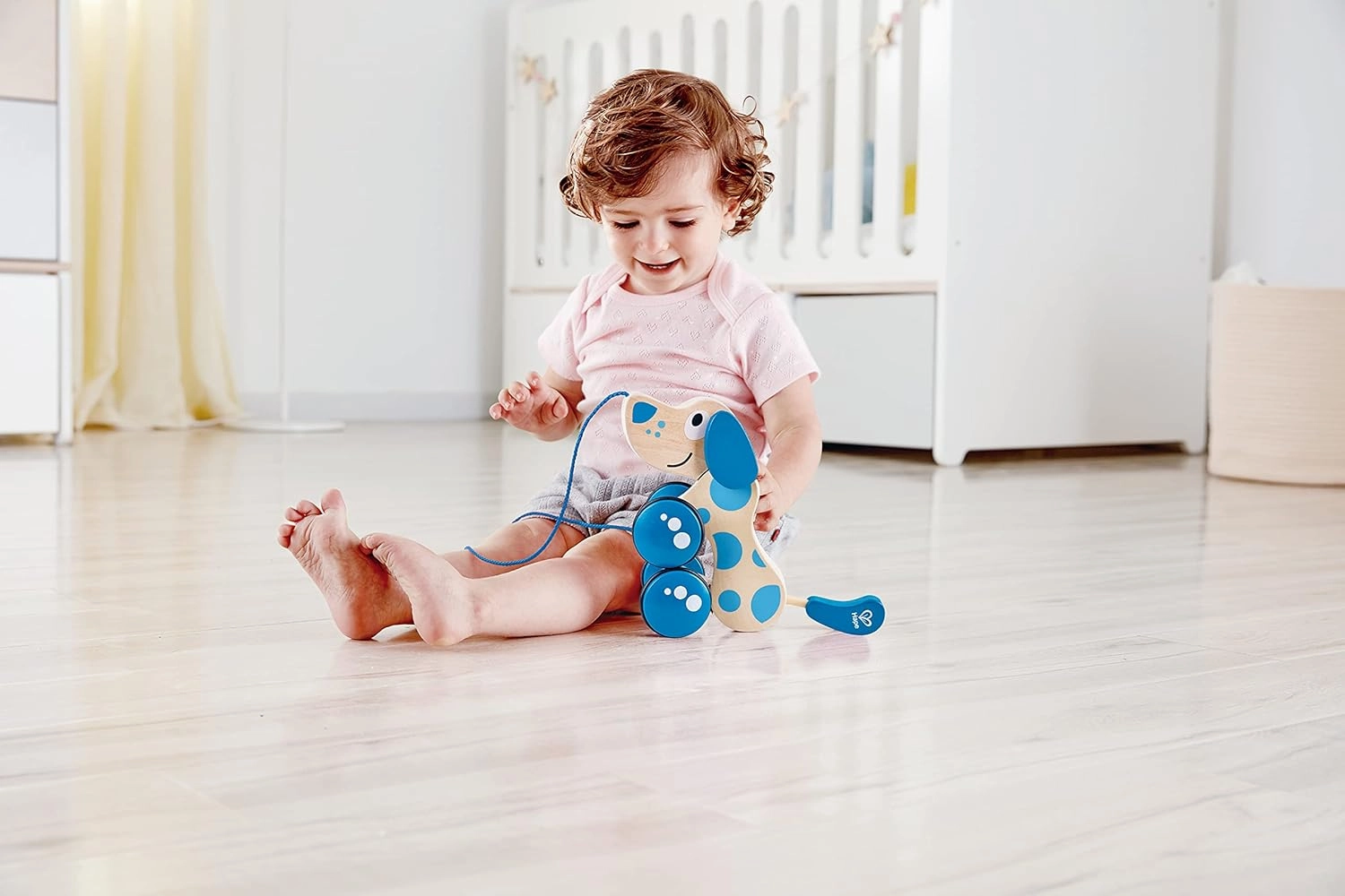 Hape Walk-A-Long Puppy Wooden Pull Toy | Push Pull Toy Puppy for Toddlers Can Sit, Stand and Roll. Rubber Rimmed Wheels for Easy Push and Pull Action, Blue