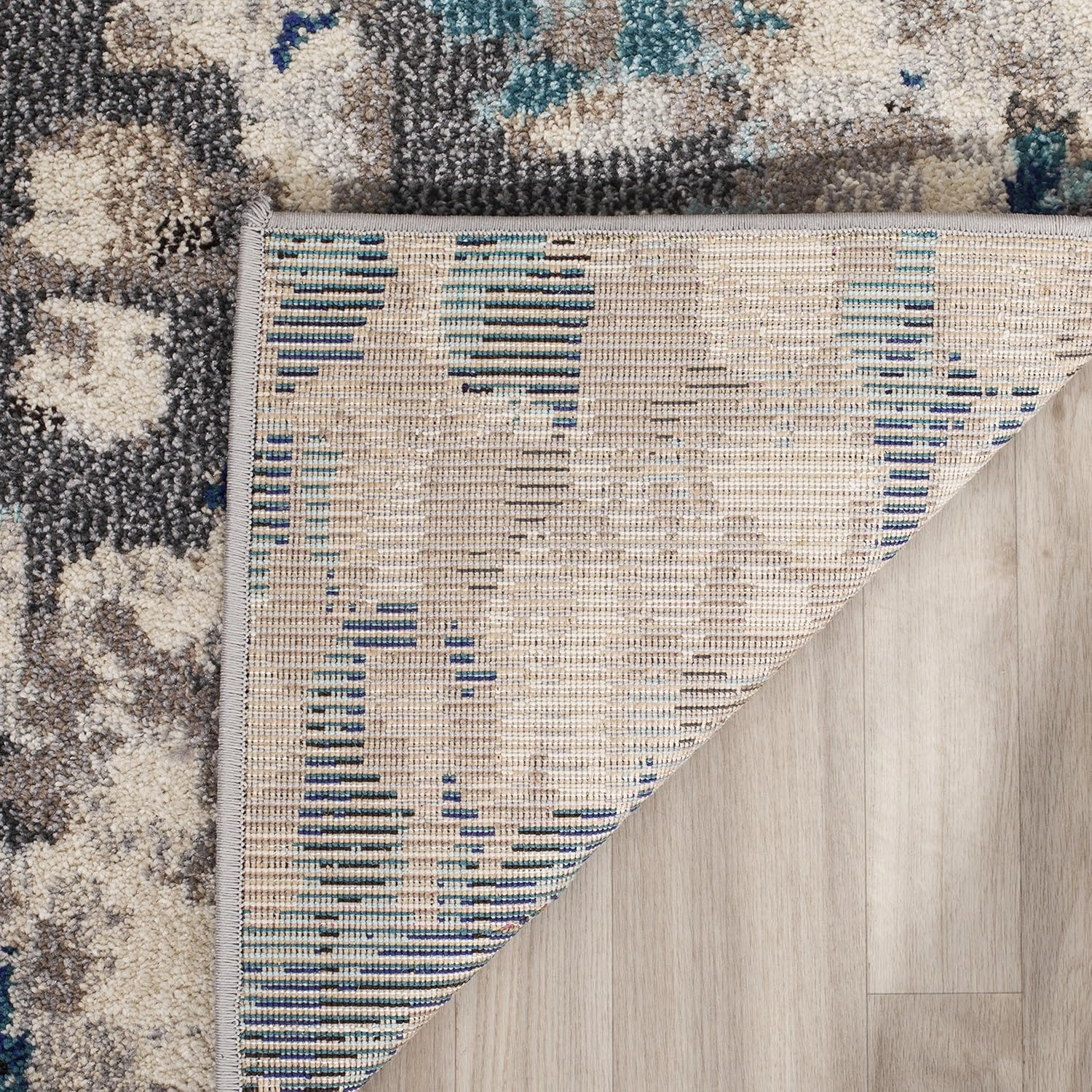 SAFAVIEH Monaco Collection Area Rug - 5'1" x 7'7", Grey & Light Blue, Boho Chic Abstract Watercolor Design, Non-Shedding & Easy Care, Ideal for High Traffic Areas in Living Room, Bedroom (MNC225E)